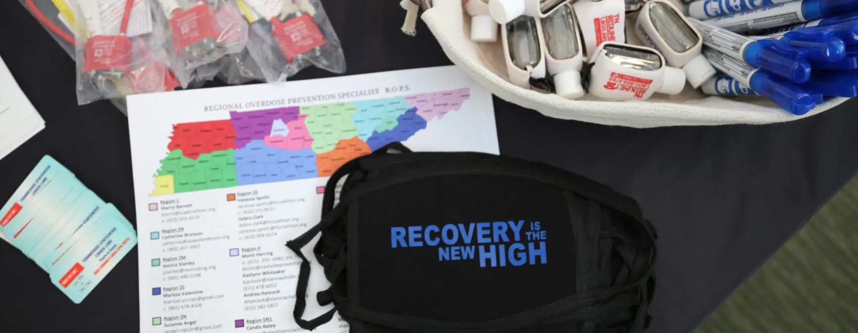 Photo illustration showing map of Tennessee and a pouch labeled, Recovery is the new high