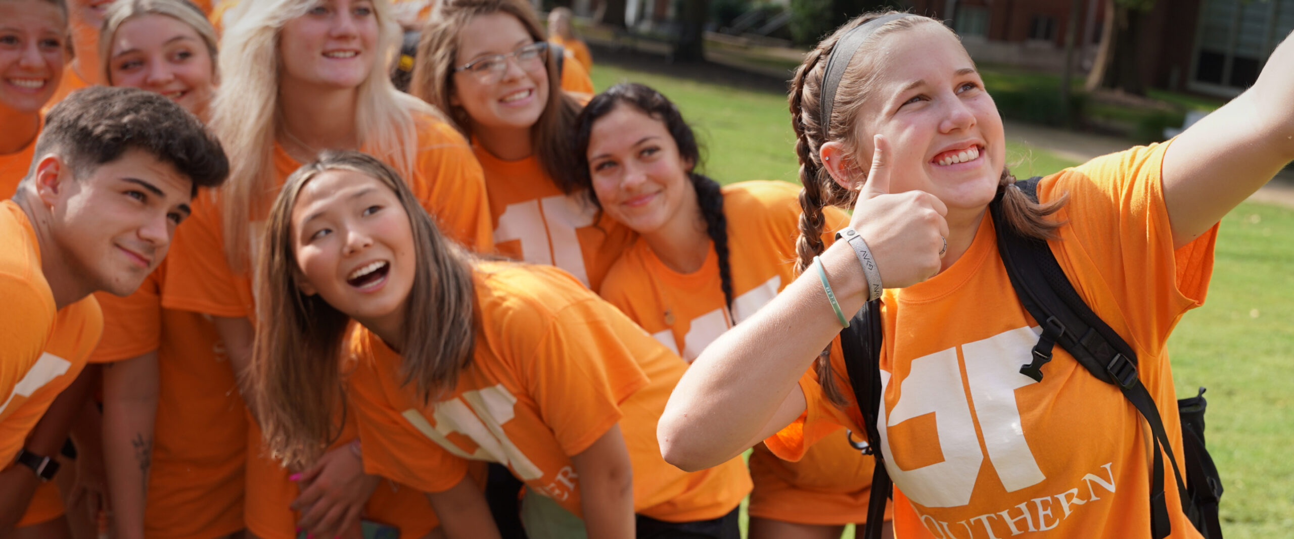 Students taking a selfie in UT Southern shirts