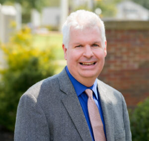 Portrait picture of Todd Jones on the campus green